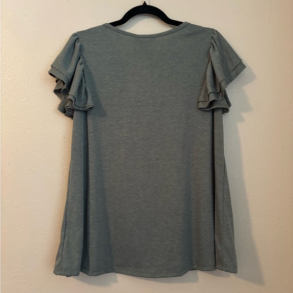 Dainty Fem Ruffle Top
NWT - Picture 3 of 7